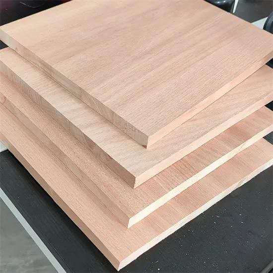 Stacked Okoumé timber boards